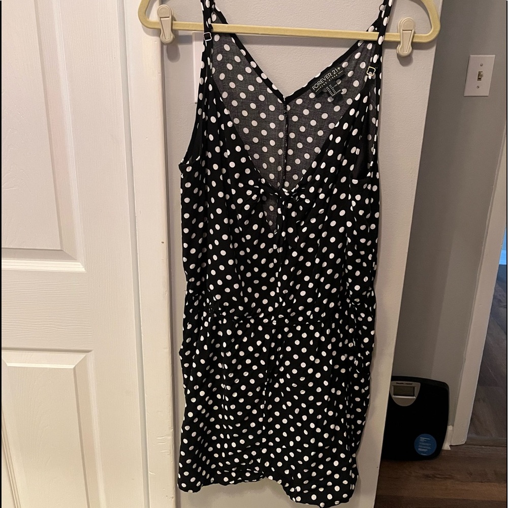 Forever 21 black and white poka dot romper. Worn 1x. Size 2XL.
